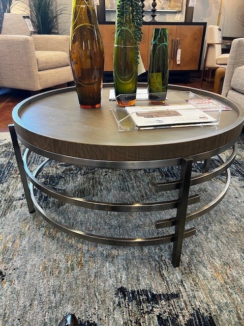 NEW Floor Model Clearance Round Cocktail Table by Ashley in Zinelle Gray